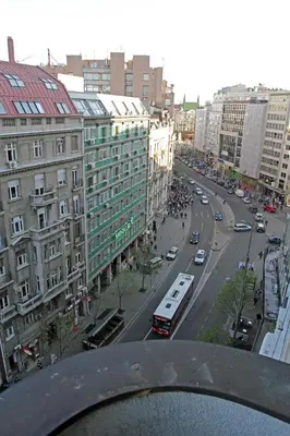 a view of a city street with cars and a bus at Belgrade Republic Square Apartment in Belgrade
