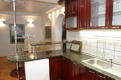 a kitchen with a counter top and a sink at Belgrade Republic Square Apartment in Belgrade