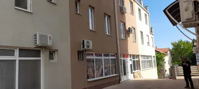 a man standing in front of a building at TPC 9 in Žarkovo