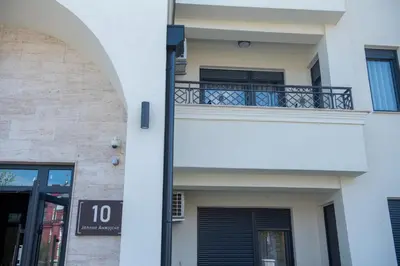 a view of a building with a balcony at Hemingway LUX in Arandjelovac