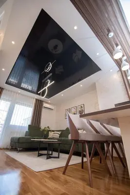 a living room with a couch and a table at Hemingway LUX in Arandjelovac