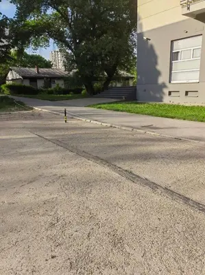 a street with a yellow fire hydrant in the middle of a road at Azzaro apartment with two bedrooms in Bežanija