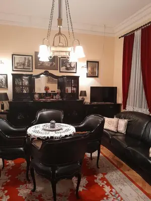 a living room with a couch and a table at VILA SREM in Ruma