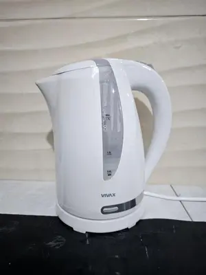 a white toaster sitting on top of a counter at SLEEP & GO in Surčin
