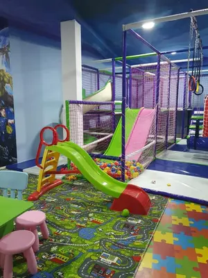 a play room with a slide and a playground at Small cute doublebed room A4 in Pančevo in Pančevo