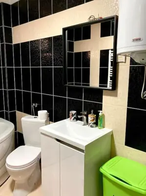 a bathroom with a white toilet and a sink at AmazingMemories3 in Belgrade