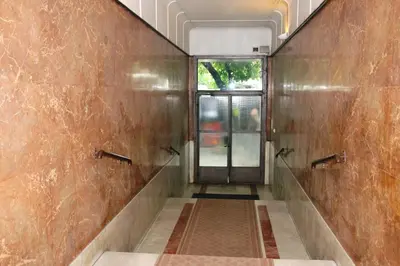 a hallway with a door in a building at Apartment Tašmajdan in Belgrade