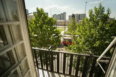 a view of a city from a balcony at All in Hostel in Belgrade