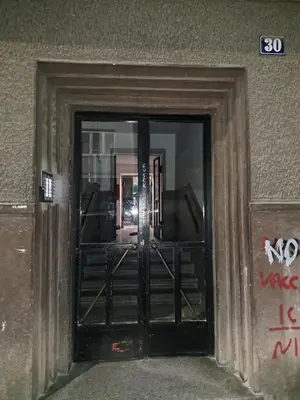 a door to a building with a glass door at Apartment BeoSun in Belgrade