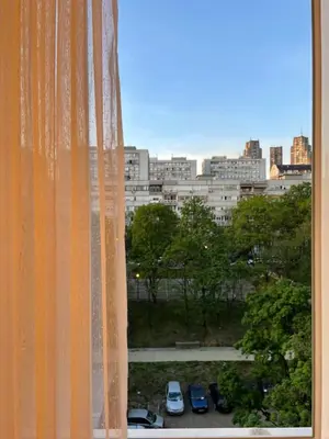 a view of a city from a window at Apartman Marija in Zvezdara