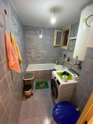 a bathroom with a tub and a sink and a toilet at Novi Beograd Dr.Agostina Neta in Novi Beograd