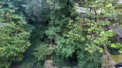 an overhead view of a garden with plants and trees at Apartman Moon in Belgrade