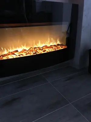 a pizza is being cooked in an oven at Apartman Oler in Smederevo