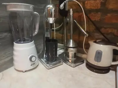 a blender and other appliances sitting on a counter at Marmelo in Belgrade