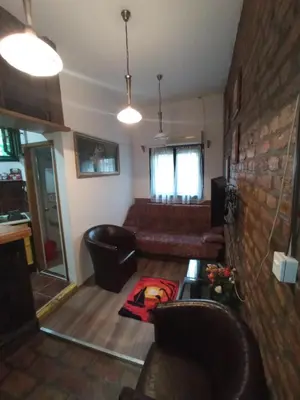 a living room with a couch and a table at Marmelo in Belgrade