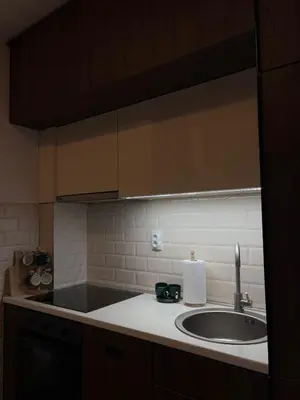 a kitchen with a sink and a counter top at Apartment SIA in Voždovac
