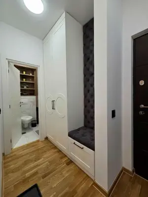 a bathroom with a toilet and a walk in closet at Oaza apartmani in Arandjelovac