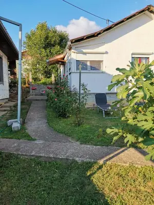 a yard with a chair and a house at \ua564 Comfy Home \ua564 - Make yourself at home in Belgrade