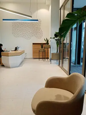 a living room with a couch and a desk at Belgrade Waterfront 1409 in Belgrade