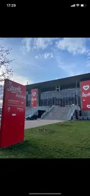 a large building with a ramp in front of it at Arena 011 in Novi Beograd