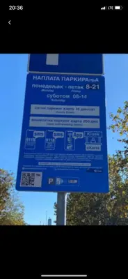 a blue sign on top of a pole at Arena 011 in Novi Beograd