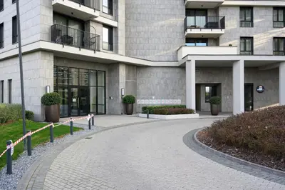 a building with a walkway in front of it at inJoy in Belgrade