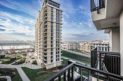 a view of a building from a balcony at inJoy in Belgrade