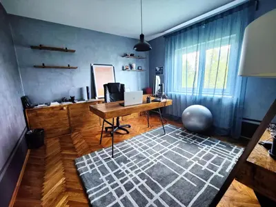an office with a desk with a laptop on it at Hedonists Paradise in Omoljica