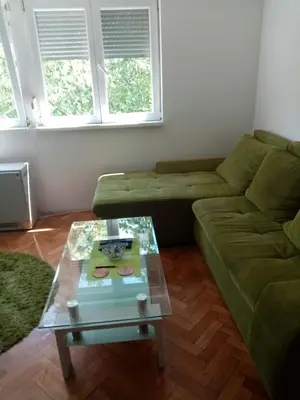 a living room with a couch and a coffee table at Martin in Belgrade