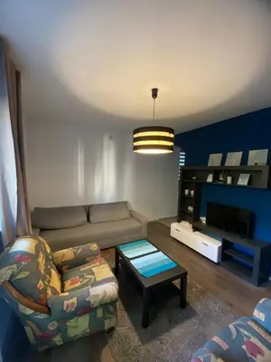 a living room with a couch and a table at Studio 43 in Belgrade