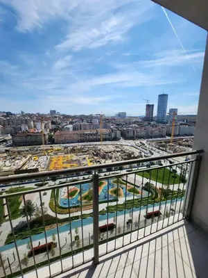 a view of a city from a balcony at BW VERDE LUX in Sajmište