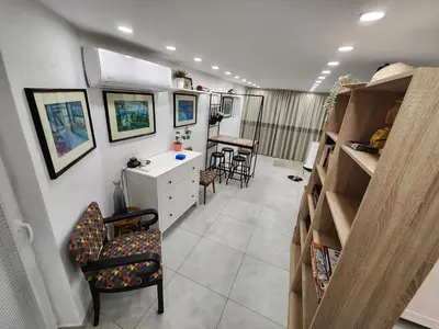 a room with a desk and a chair in a room at Professor's Krunska Studio in Belgrade