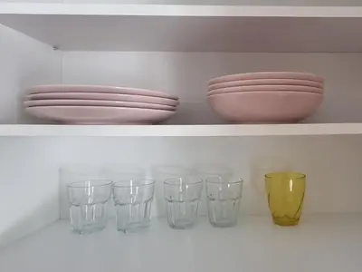 a shelf with bowls and glasses on it at HUGO OLD TOWN in Belgrade