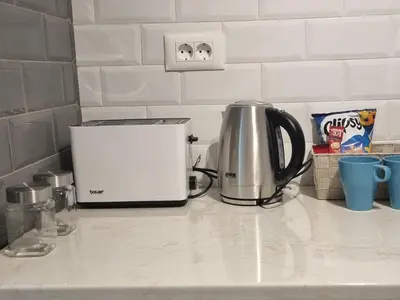 a kitchen counter with a toaster and a coffee maker at HUGO OLD TOWN in Belgrade