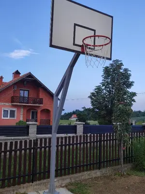 a basketball hoop in front of a fence at Starčević apartmani Orašac Aranđelovac OBAVEŠTENJE Proveriti raspoloživost putem poruke zbog učestalih lažnih rezervacija in Orašac