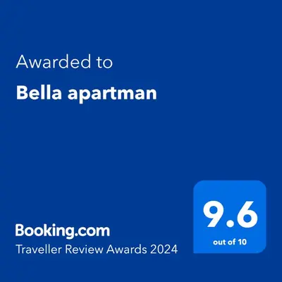 a screenshot of a cell phone with the text awarded to bellania apartment istg at Bella apartman in Mladenovac