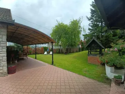 a garden with a pavilion and a gazebo at Apartman u potkrovlju in Sremski Karlovci