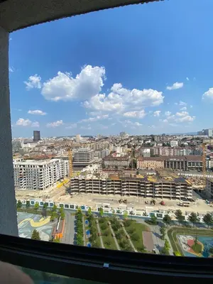a view of a city from a window at Verde 18 in Sajmište