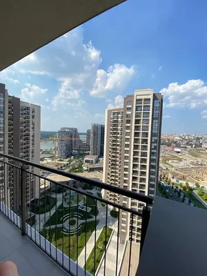 a balcony with a view of a city at Verde 18 in Sajmište