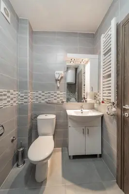 a bathroom with a toilet and a sink at Port 1 in Belgrade