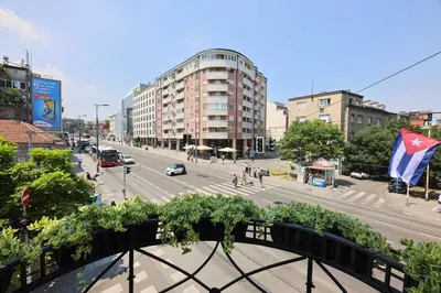a view of a city street with cars and buildings at Villa 1927 in Belgrade
