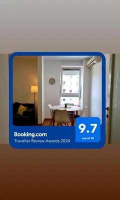 a picture of a room with a table and a window at Euforia apartment in Novi Beograd