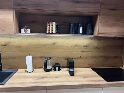 a kitchen counter with a counter top at Luxe Living Modern Apartment Stara Pazova in Stara Pazova