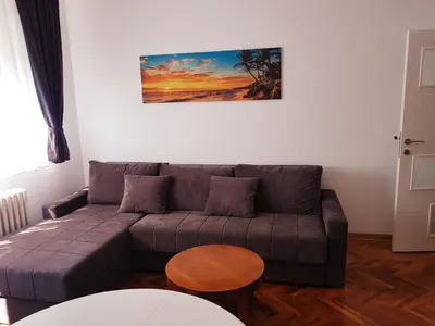 a living room with a couch and a table at Emili apartment in Belgrade