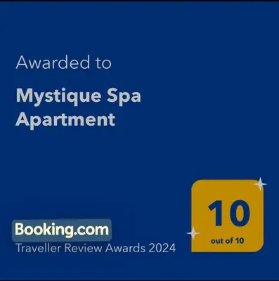a yellow sign that reads awarded to mysterious spa appointment at Mystique Spa Apartment in Belgrade