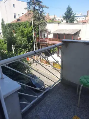 a balcony with a view of a street and a building at Nena Apartman in Belgrade