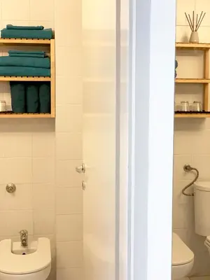 a bathroom with a toilet and a sink at Miu Arena Apartment in Belgrade