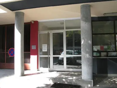 an entrance to a building with glass doors at Apartment Deligradska in Belgrade