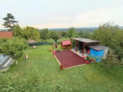 an aerial view of a garden with a gazebo at Sava Land in Belgrade