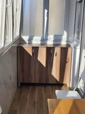 a room with a wooden counter with a window at Magenta New Belgrade in Belgrade